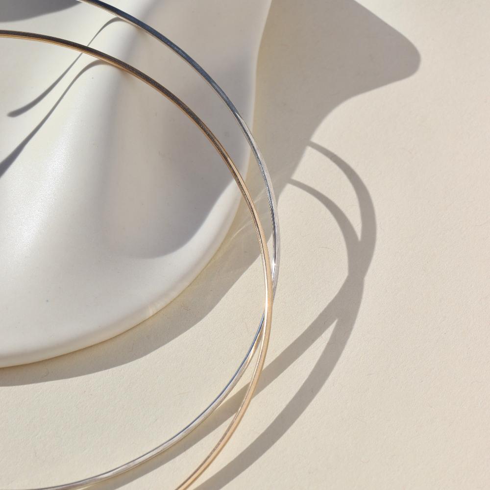 14k gold fill and 925 sterling silver collarbone necklaces by token jewelry