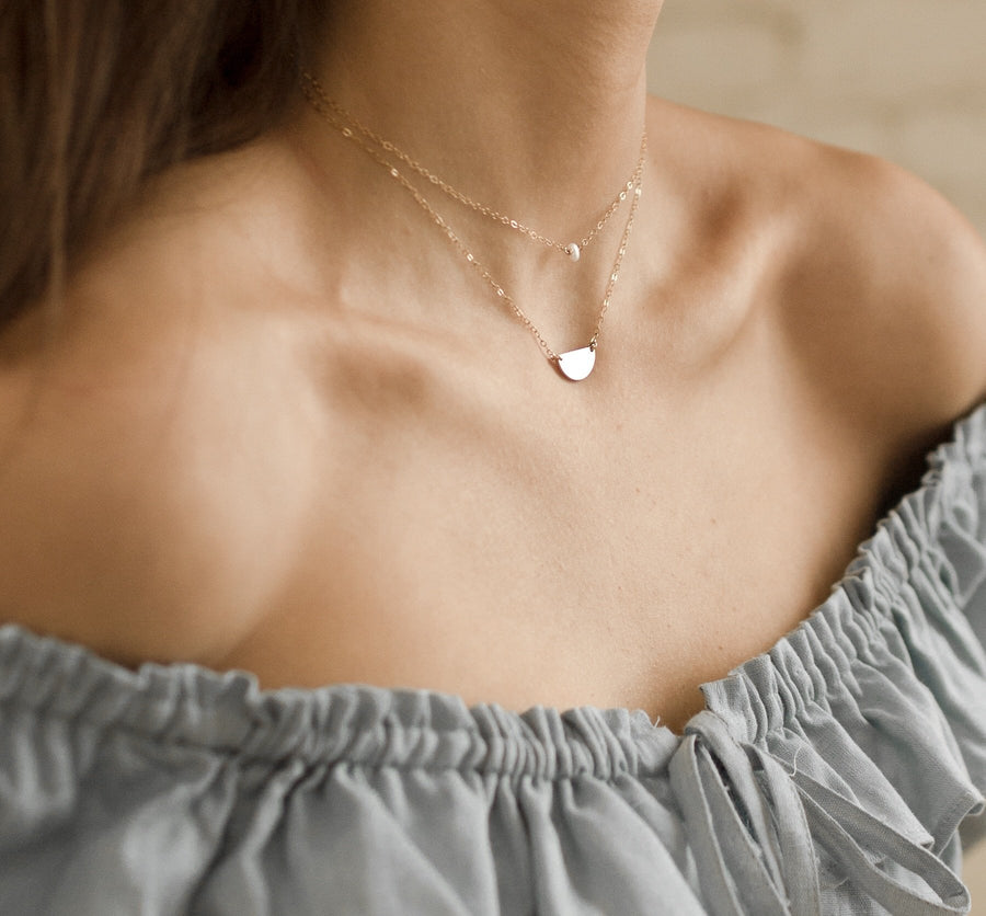 Model wearing Mini pearl Necklace.