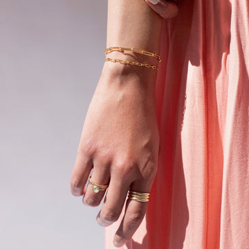 Model found wearing 14k gold fill Sweet Pea Ring, also worn with multiple different rings.