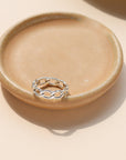 Alex Ring in gold fill and sterling silver, structural curb chain design, shown stacked with other rings and worn solo