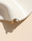 Curved hammered stacking ring in gold fill with a rainbow-like arc shape