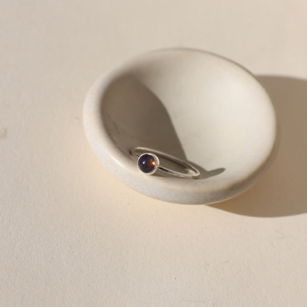 Black Opal Ring with a bezel-set 5mm stone in sterling silver or 14k gold fill, featuring flashes of green, blue, and violet