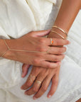 Model wearing fiery carnelian glow ring in gold fill setting