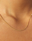 14k gold fill chain necklace on a model