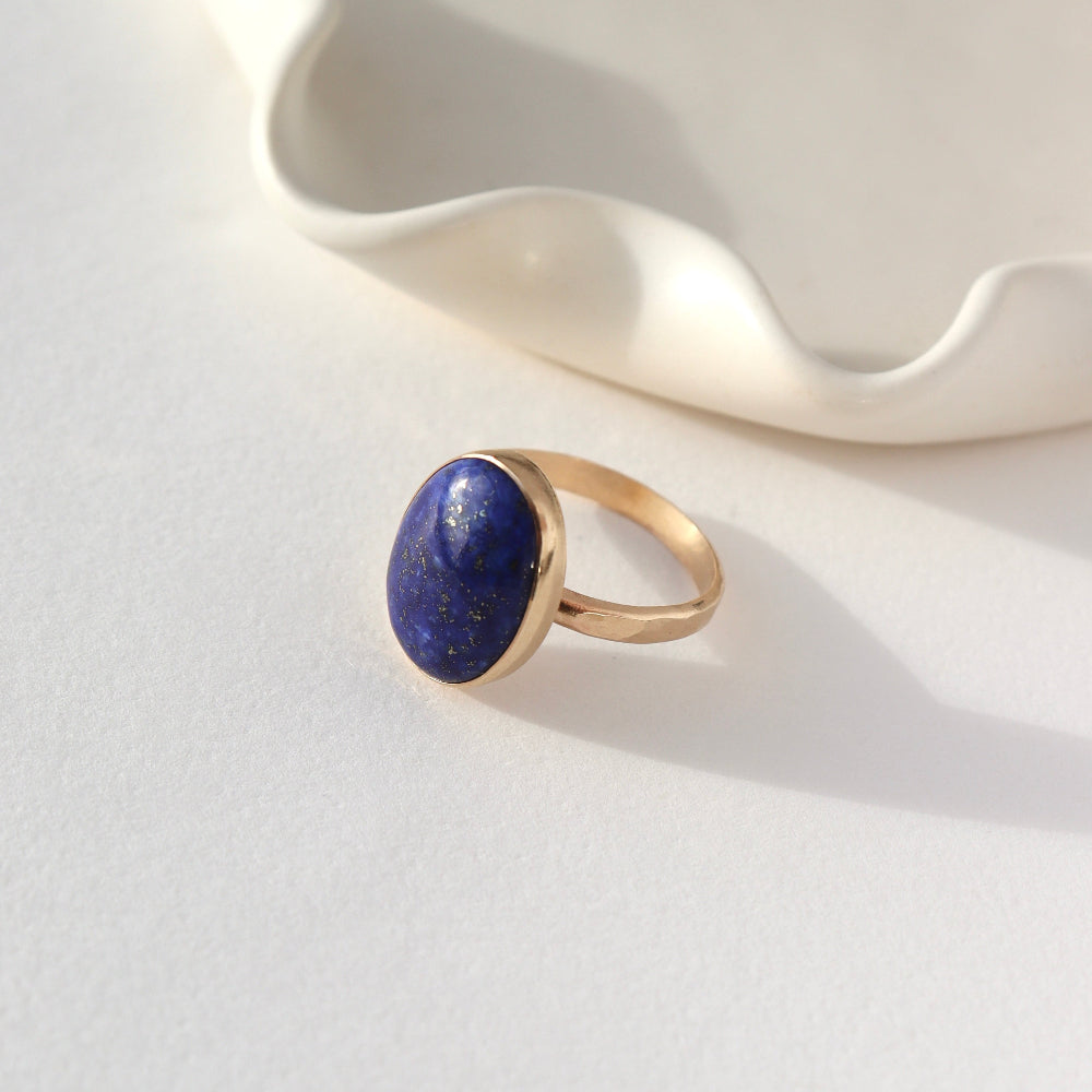 Lapis Lazuli Gemstone Ring in 14k gold fill. This ring features a thick gold hammered band with a 12x16mm Lapis gemstone.