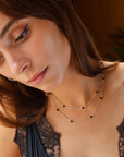 The Lennox Chain features smooth black tourmaline gemstones along a delicate cable chain—crafted in gold fill or sterling silver for balance and protection