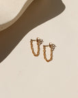 14k gold fill chain stud earrings in the sunlight