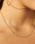 Model wearing 14k gold fill Capri Chain.