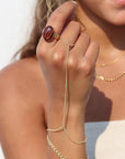 Model wearing Gemini Hand Chain
