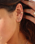 model wearing 14k gold fill chain threader earrings