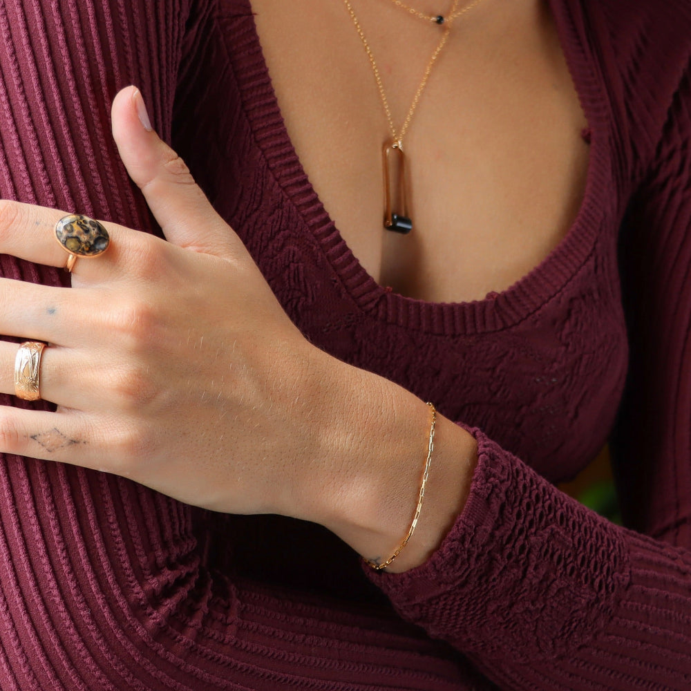 Nova Chain Bracelet in 14k gold fill or sterling silver, featuring a sleek box chain that reflects light with every movement