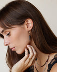 Onyx Drops featuring matte claw-shaped onyx stones suspended from polished gold fill chain and ball posts
