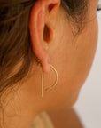 Model wearing 14k gold fill, P shaped threaders