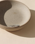 sterling silver sequin ring on a little dish