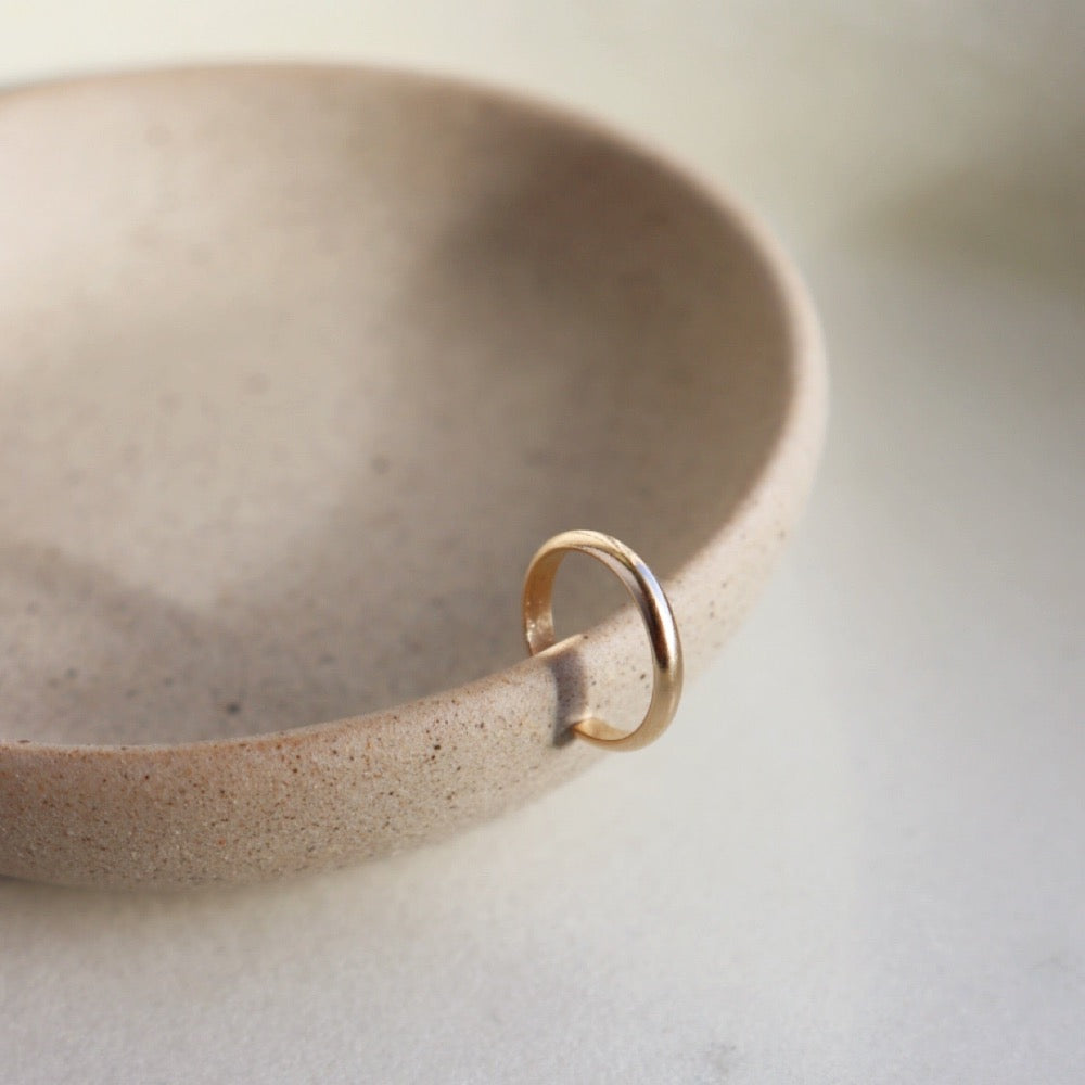 14k gold fill Simple Ear Cuff. This Ear Cuff features a simple band that is smooth on the outside.