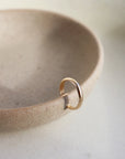 14k gold fill Simple Ear Cuff. This Ear Cuff features a simple band that is smooth on the outside.