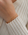 Sunspell Bracelet with softly textured links, available in 14k gold fill or sterling silver. Lightweight and comfortable, perfect for effortless layering and adding a subtle glow to any stack.