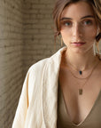 Model wearing 14k gold fill Tunnel Hoops - Token Jewelry - jewelry store near me - Eau Claire jewelry store