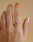 Model wearing 14k gold fill Opal Ring - Token Jewelry