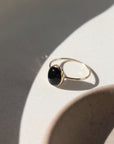 Black Agate Ring - Oval cut black onyx gemstone handset in an oval bezel. Shown in 14k gold fill. Also available in Sterling Silver. By Token Jewelry in Eau Claire, WI Gemstone Jewelry