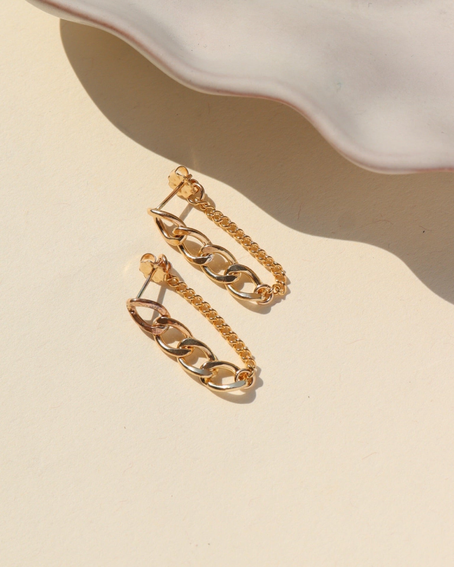 14k gold fill alex chain stud earrings handmade by token jewelry, featuring 4 links of our favorite Alexandra Chain attached to a small section of our La Mer chain.