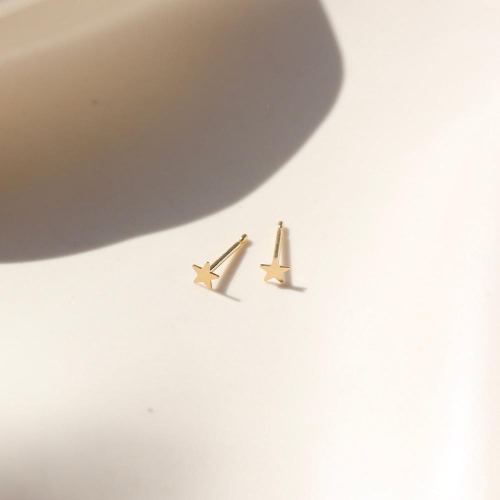 Our Stardust Studs are a celestial stud for an everyday minimal look. They pair perfectly with our Tiny Moon Studs to create a full sky!