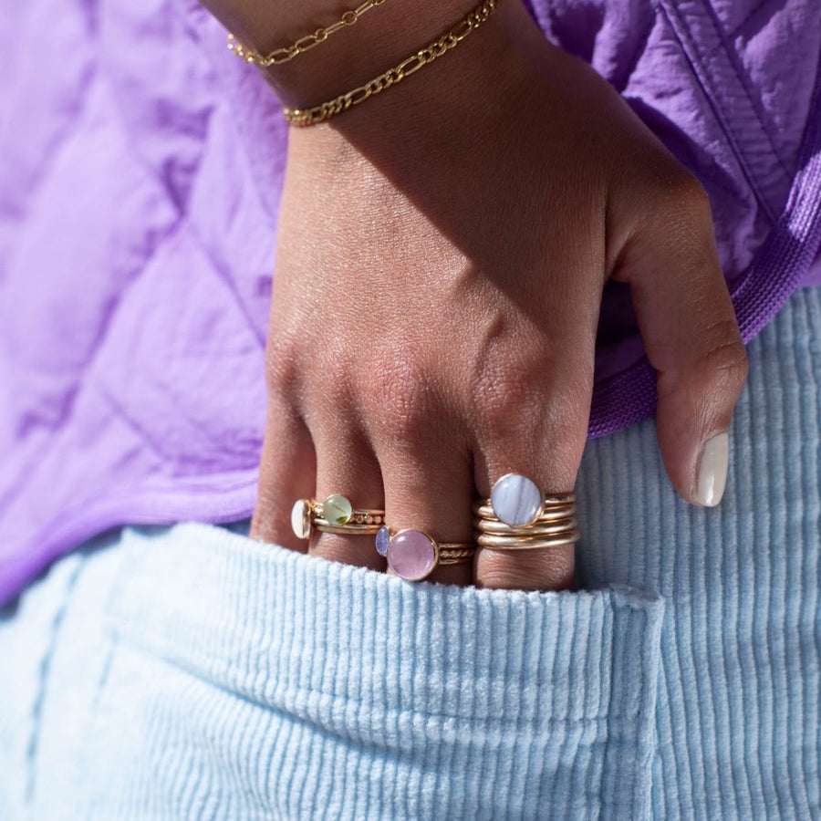 Model wearing 14k gold fill Pippa Ring on her middle finger.