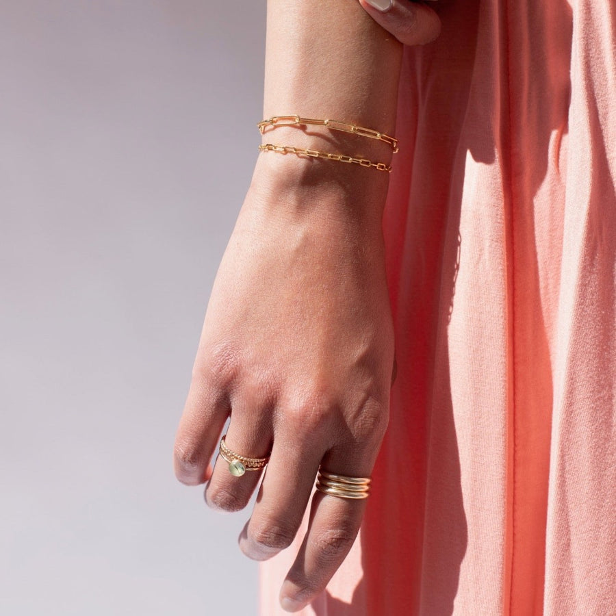 Model found wearing 14k gold fill Sweet Pea Ring, also worn with multiple different rings.