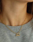 Model wearing 14k gold fill Brooklyn Toggle necklace, Handmade in Eau Claire Wisconsin.