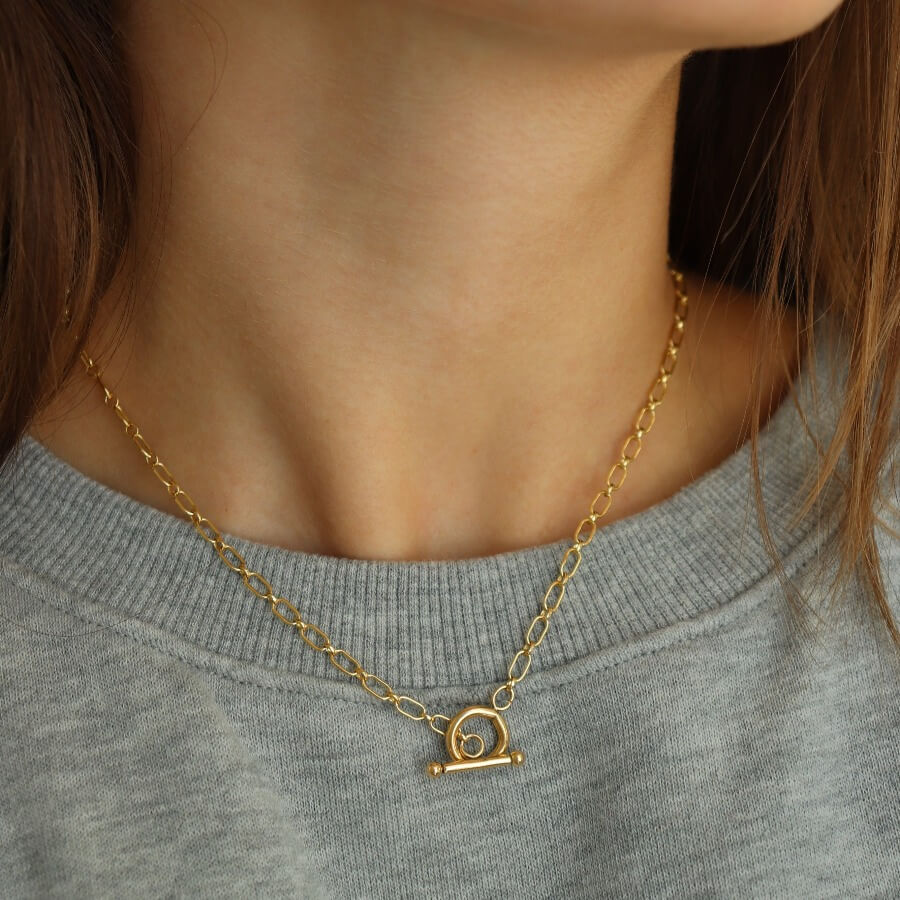 Model wearing 14k gold fill Brooklyn Toggle necklace, Handmade in Eau Claire Wisconsin.
