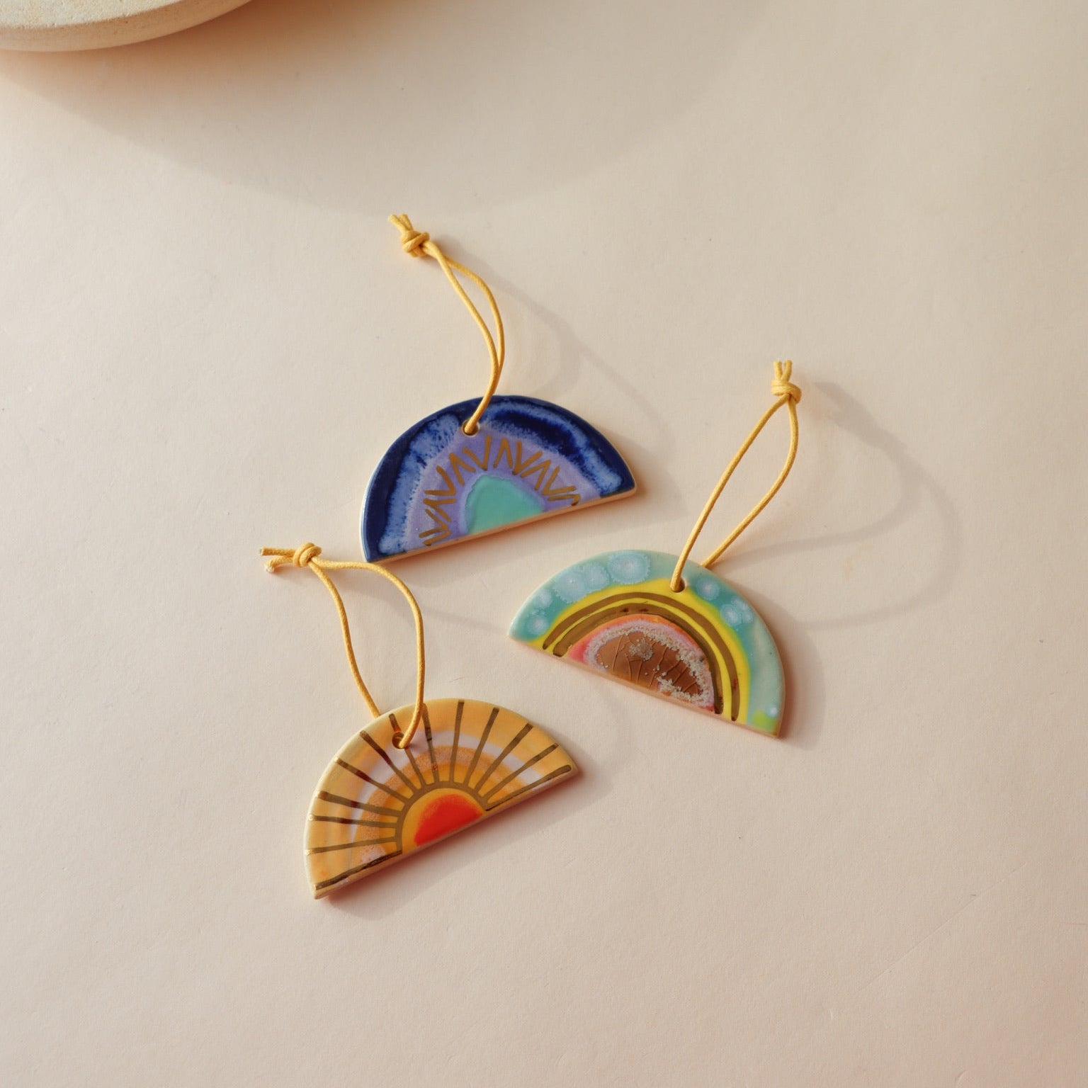 Happiness Ornament by Curious Clay