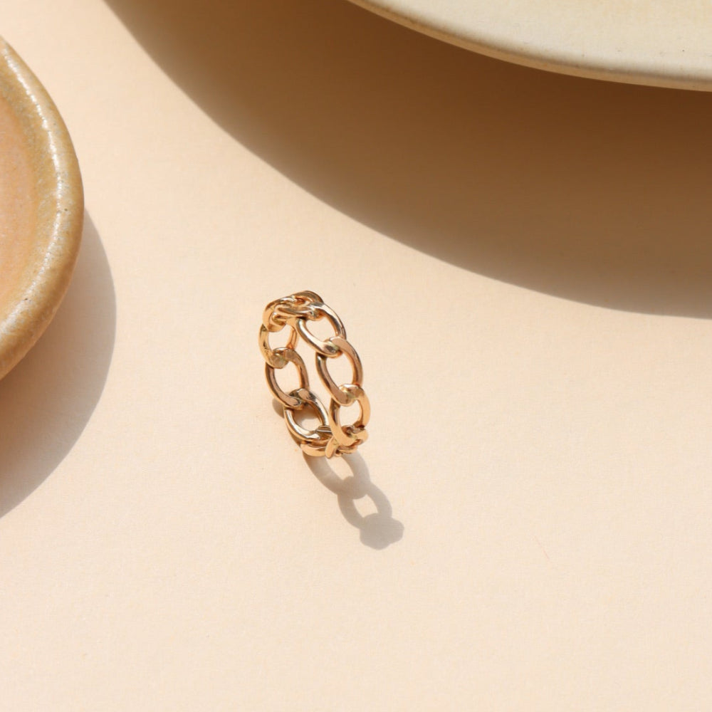 Alex Ring in gold fill and sterling silver, structural curb chain design, shown stacked with other rings and worn solo
