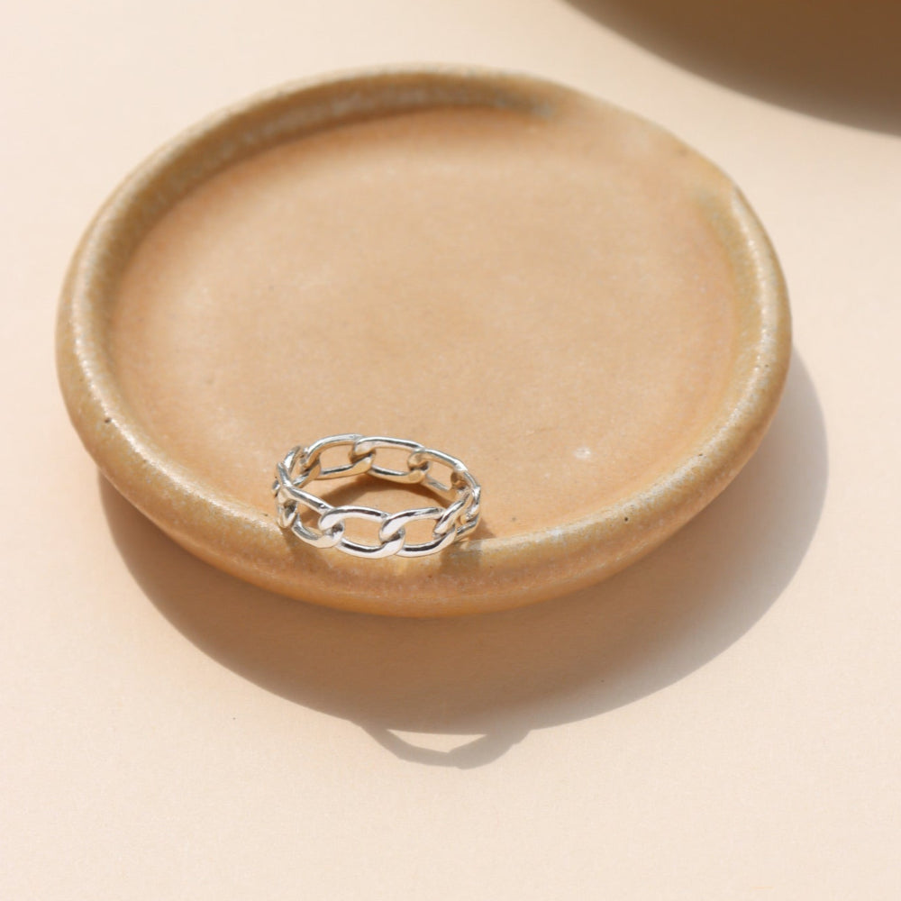 Alex Ring in gold fill and sterling silver, structural curb chain design, shown stacked with other rings and worn solo
