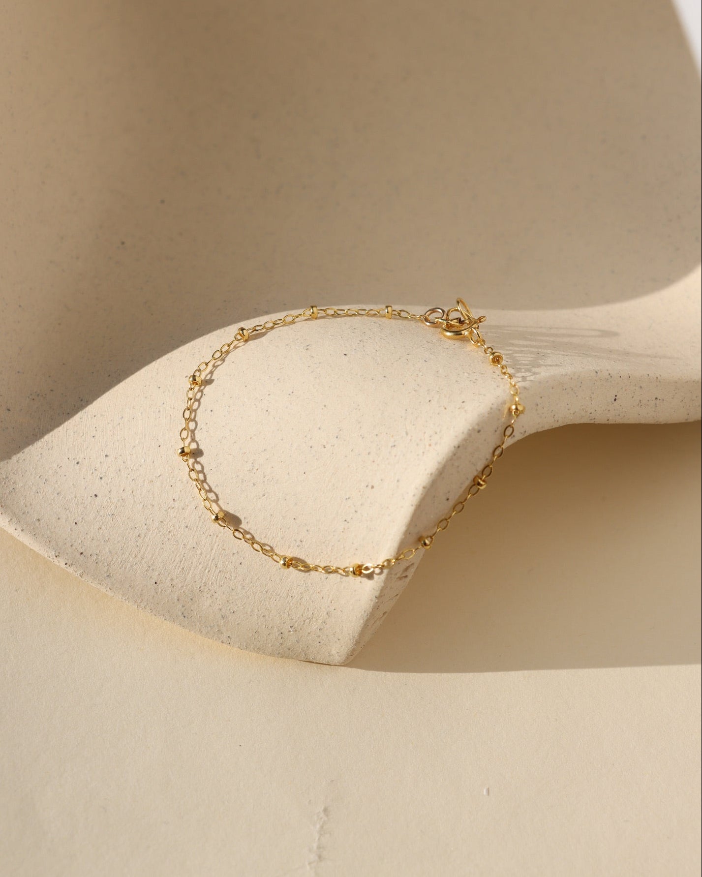 Beaded Bracelet with delicate textured beads that catch the light. Lightweight and timeless, perfect for layering or wearing alone.