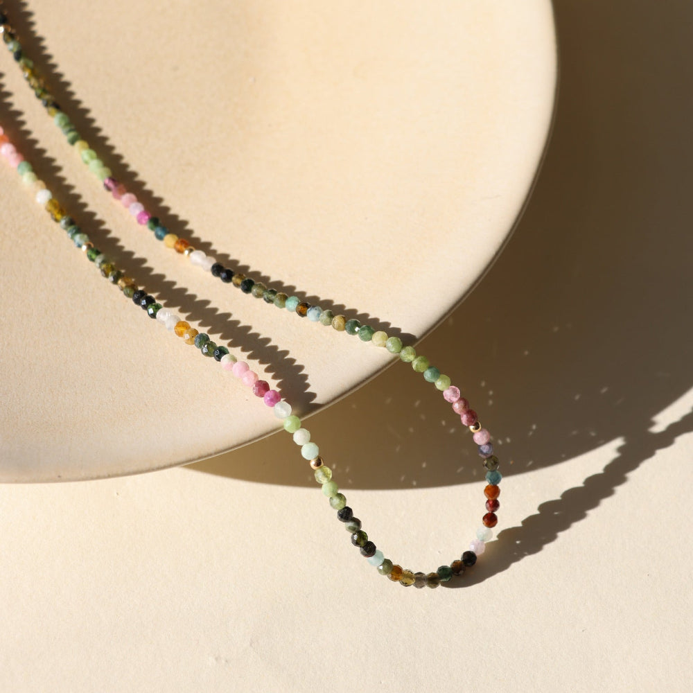 Tourmaline Beaded Necklace — mixed tourmaline beads in soft, earthy tones. Available in 14K gold fill or sterling silver, designed for effortless layering and everyday wear