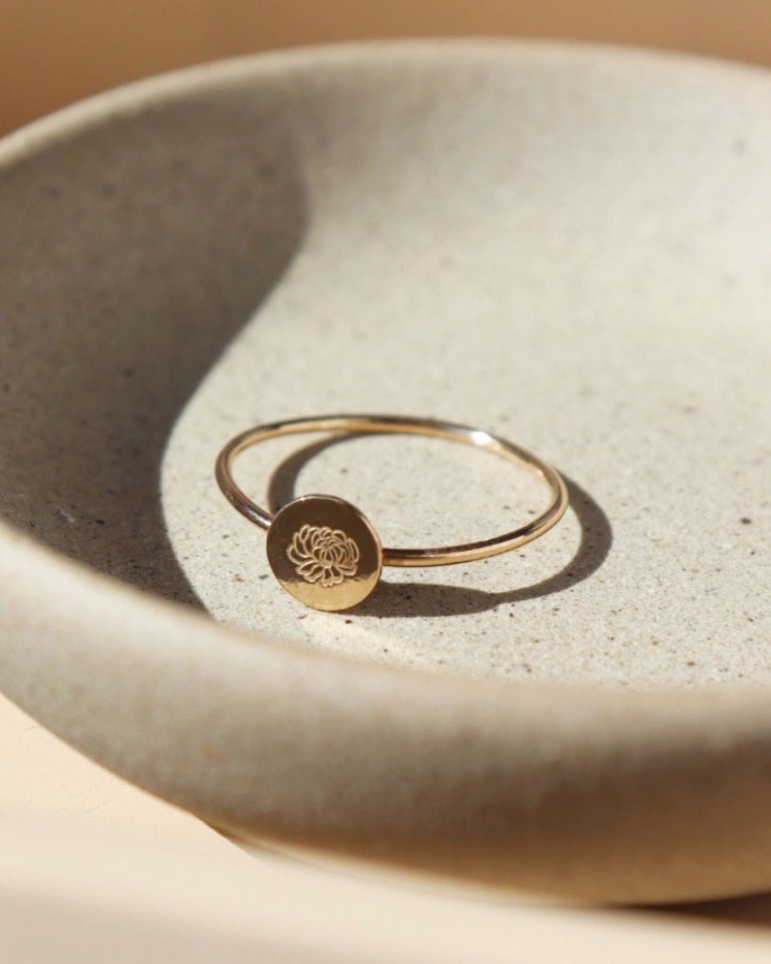 Birth flower ring featuring a Lotus flower for the month of August. Mother's Day Gifts, Personalized Jewelry, Handmade Jewelry, Gold Ring that's flower stamped by Token Jewelry in Eau Claire, WI