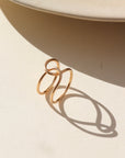 14k gold filled buckle ring in the sun.