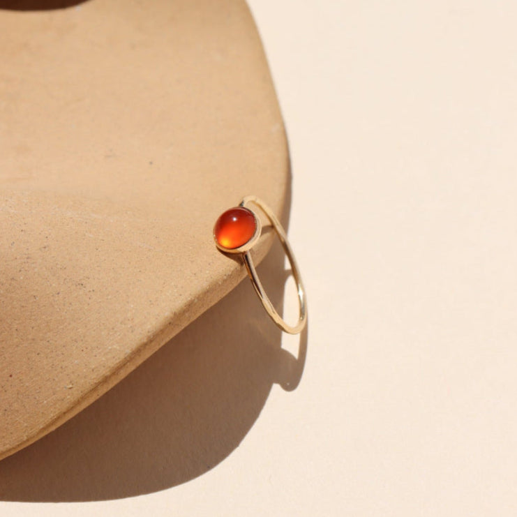  Close-up of fiery carnelian glow ring in gold fill setting