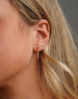 Model wearing 14k gold fill Classic studs