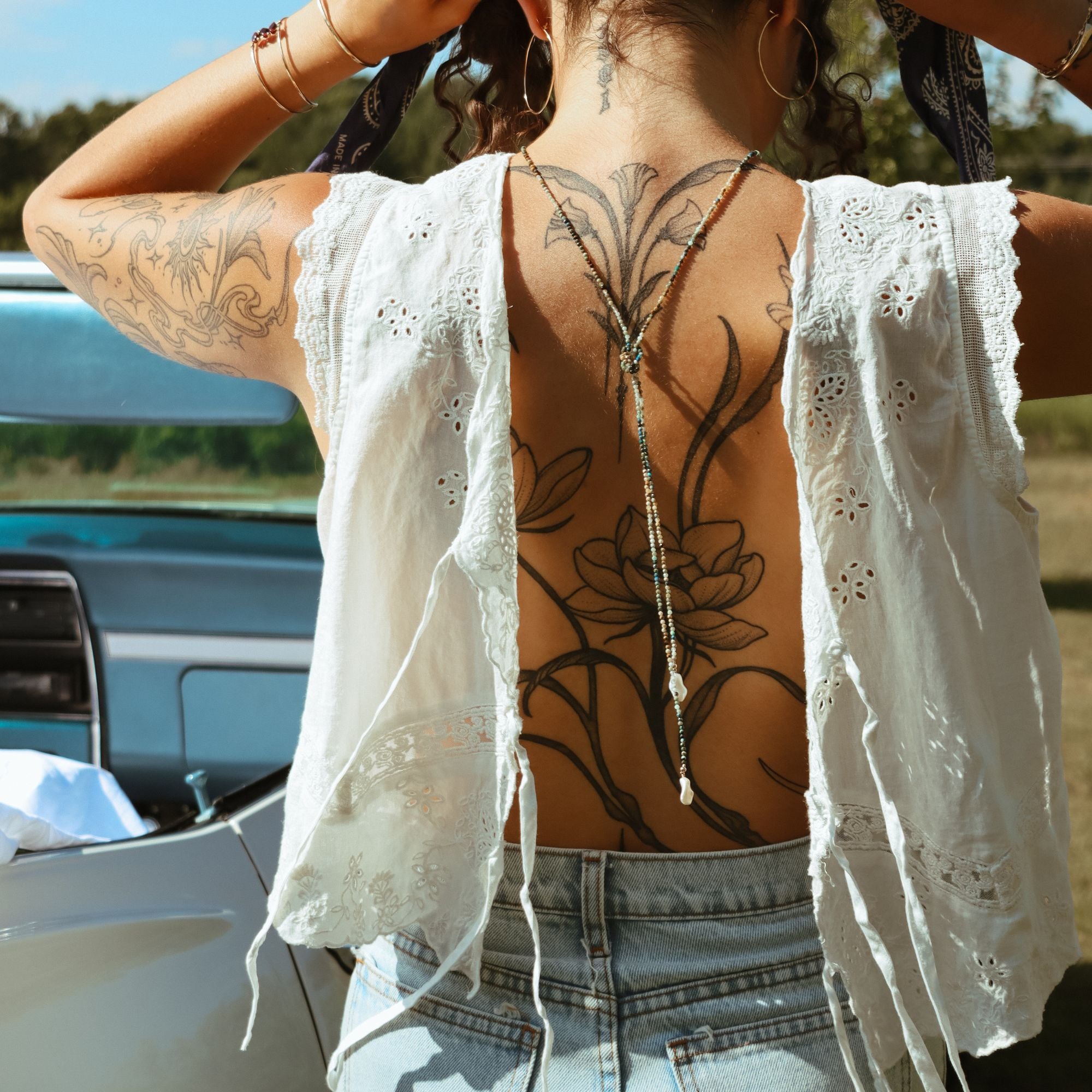 model wearing beaded wrap necklace