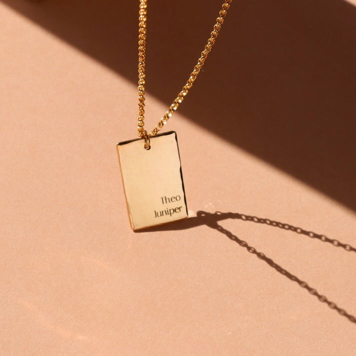 Engraved necklace with kids names.