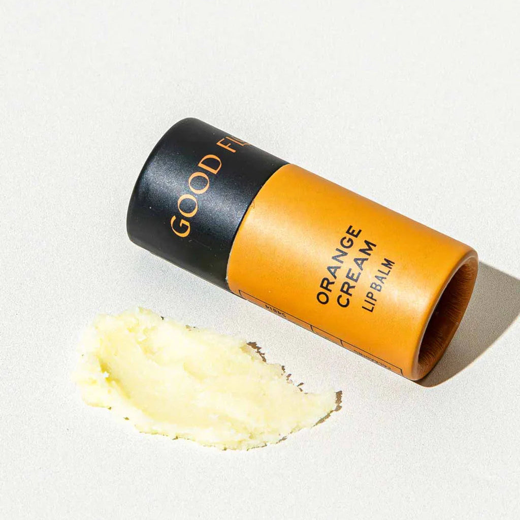 Good Fx Orange Cream lip balm on a white background