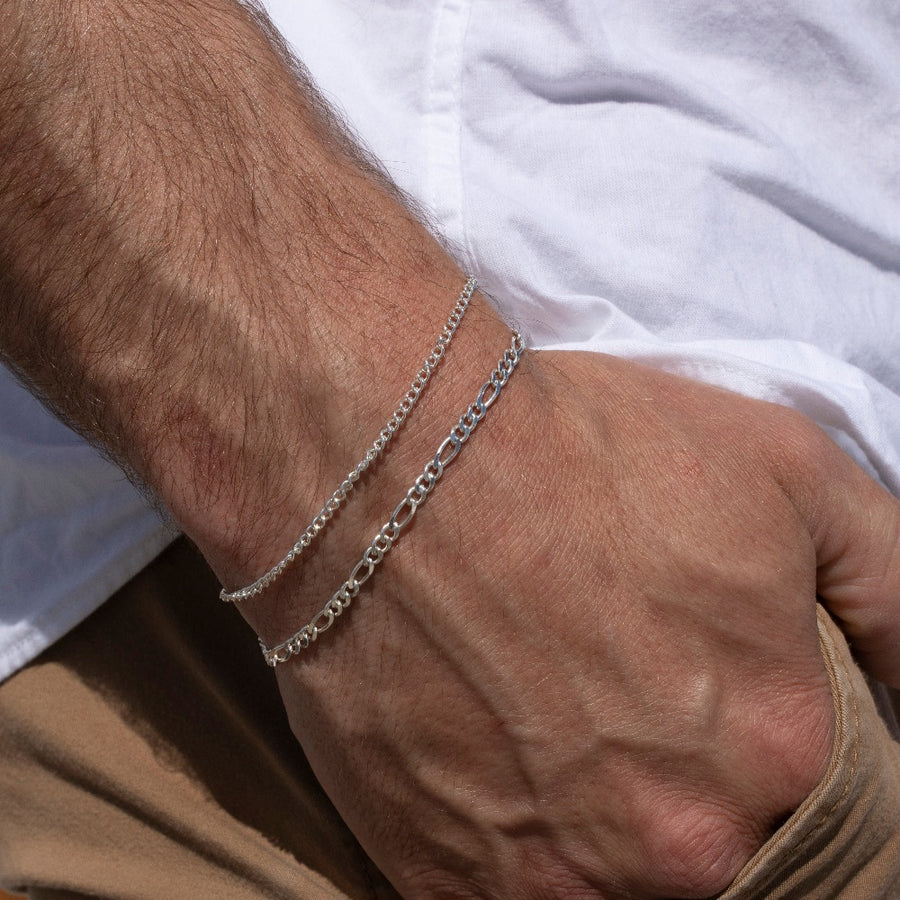 Model wearing 925 sterling silver bracelet paired with the Gigi bracelet.