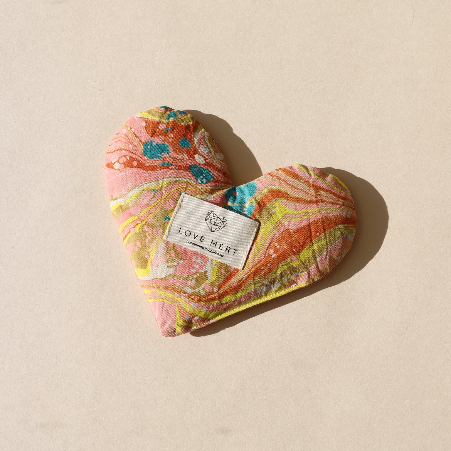 heart shaped eye pillow on a light background