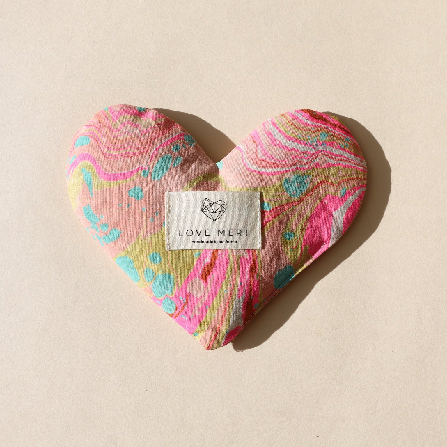 heart shaped eye pillow on a light background