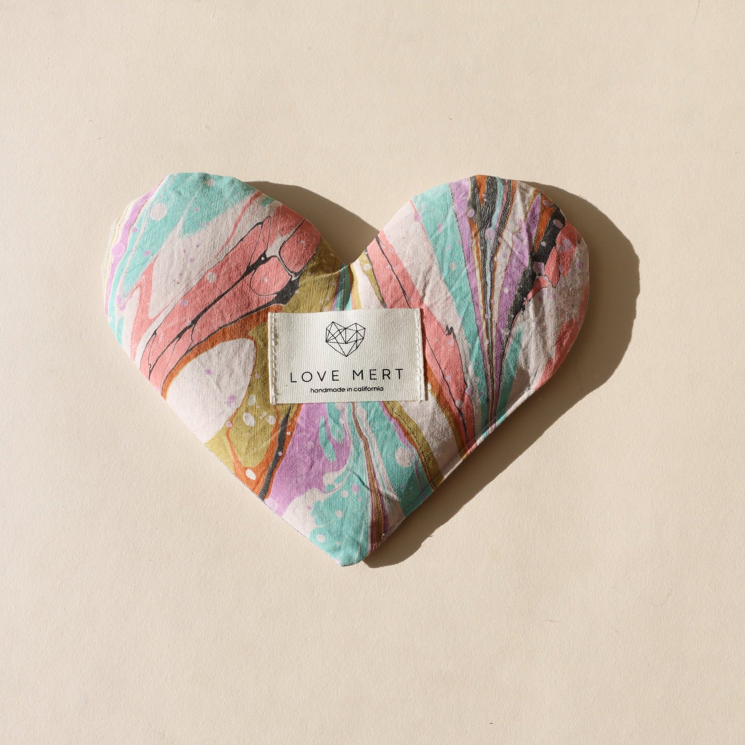 heart shaped eye pillow on a light background