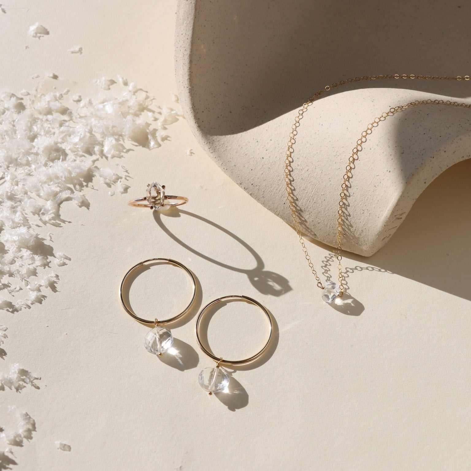 A radiant Herkimer diamond necklace with a naturally faceted quartz crystal, hand-set on a dainty gold chain for everyday elegance.