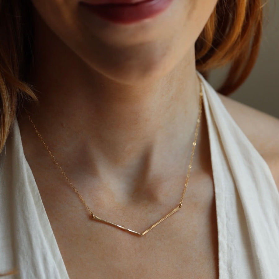 Modern geometric necklace hand hammered in 14k gold fill or sterling silver. Handmade by Token Jewelry in Eau Claire, WI  Edit alt text