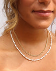Model Wearing 14k gold fill Endless pearl necklace
