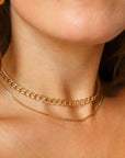 Bold and chunky 14k gold filled curb chain with a lobster clasp and 2" extender chain to make the necklace adjustable from 14" to 16". Alexandra Choker, handmade by Token Jewelry in Eau Claire, WI  jewelry store near me, permanent jewelry, jewelry repair near me, rings, earrings, necklace, bracelet, gold chain, gemstones, rose gold